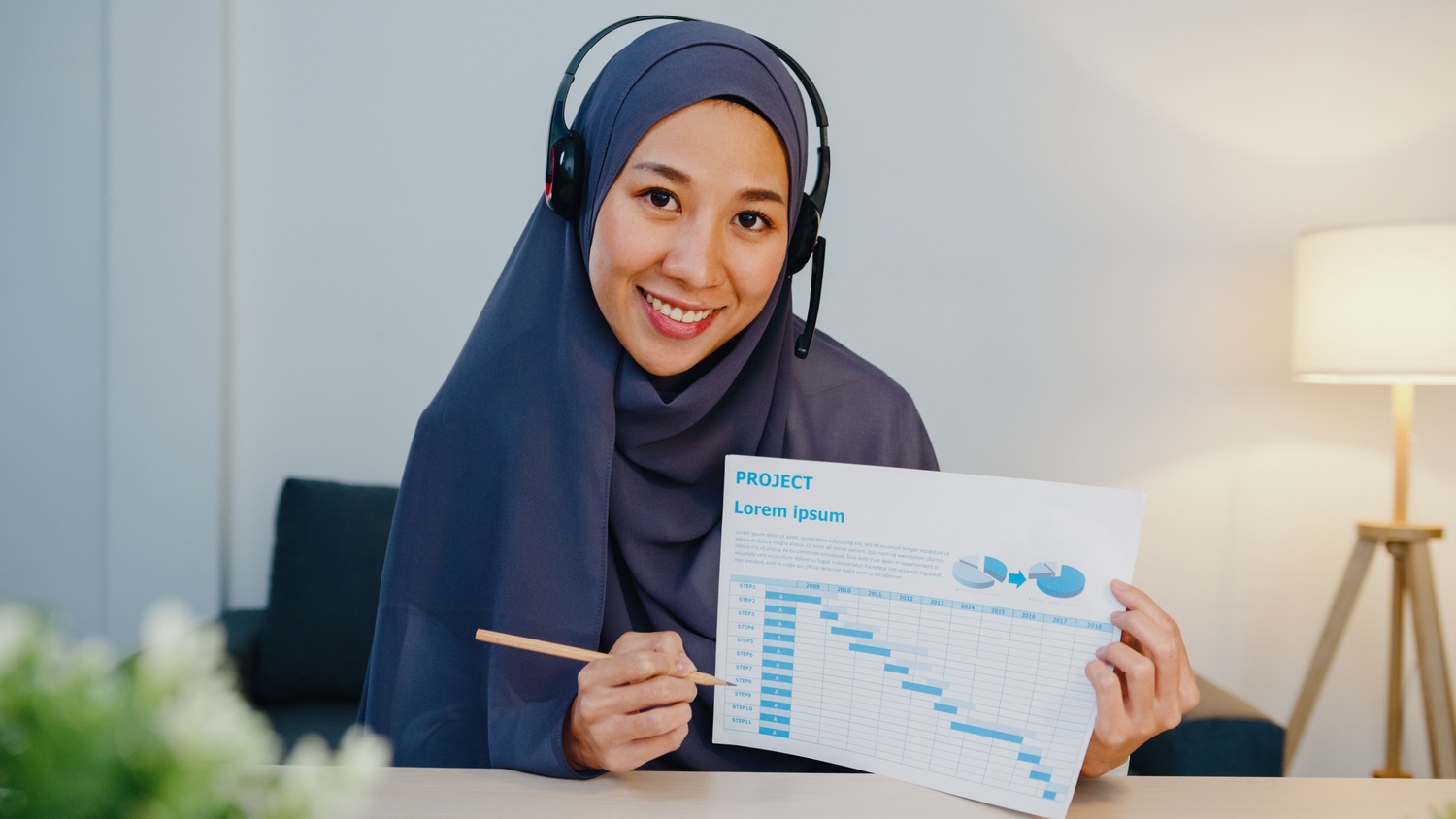 The Power of Long-Form Content in SEO muslim lady using laptop talk to colleagues in vid 9ybz8e8